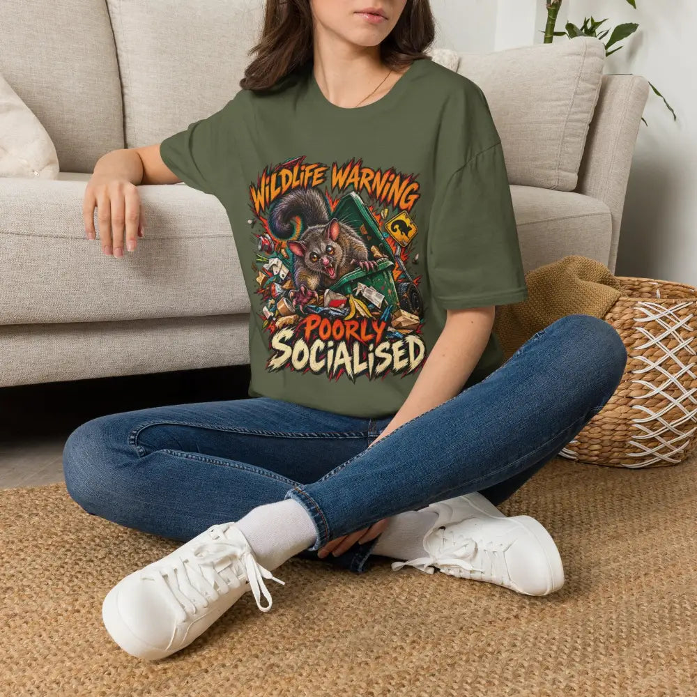 Olive green unisex t-shirt in ring-spun cotton with wildlife warning cartoon possum graphic, low heat care instructions