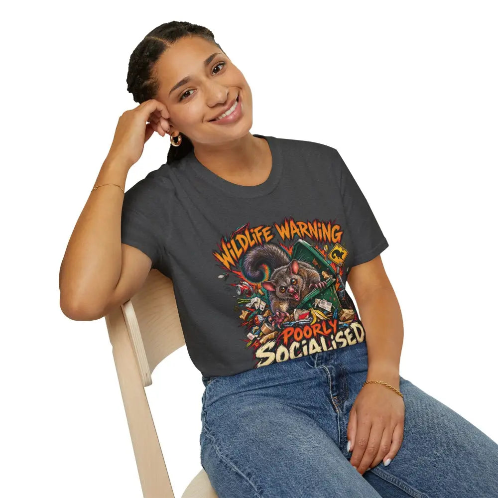 Dark gray unisex ring-spun cotton t-shirt with colorful cartoon lemur and wildlife warning poorly socialised design care instructions low heat