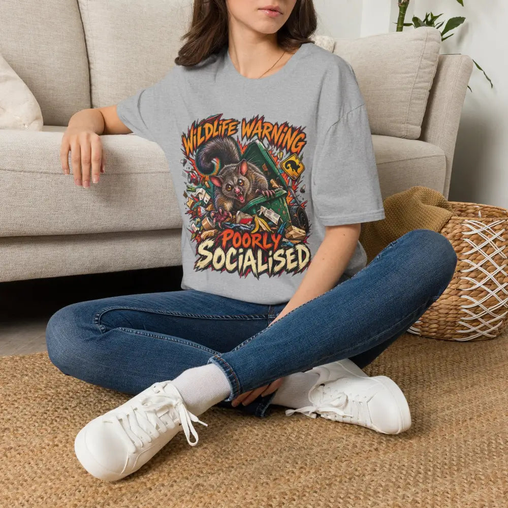 Gray ring-spun cotton unisex t-shirt with colorful cartoon possum and wildlife warning design care instructions low heat