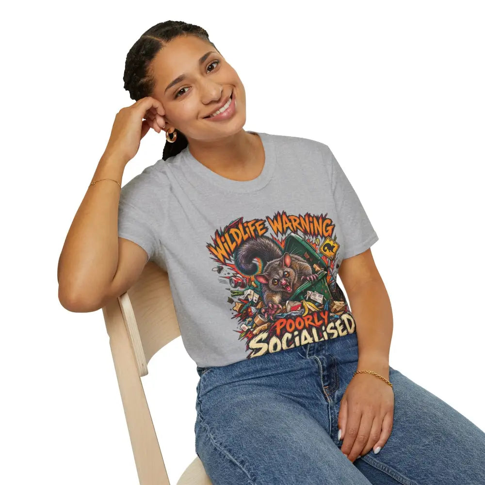 Unisex light gray short-sleeved ring-spun cotton t-shirt with colorful cartoon lemur graphic and wildlife warning text low heat care instructions