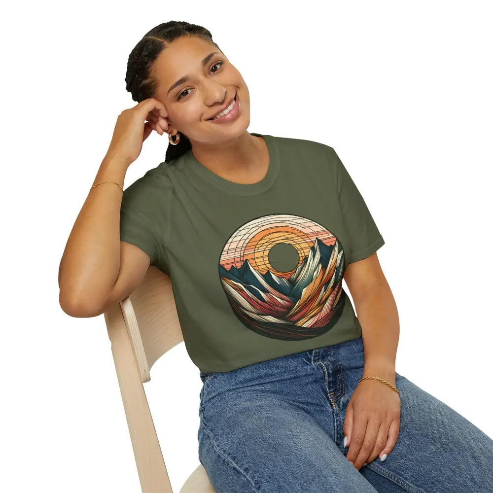 Woman wearing a vintage mountain vibes softstyle t-shirt with colorful sunset graphic