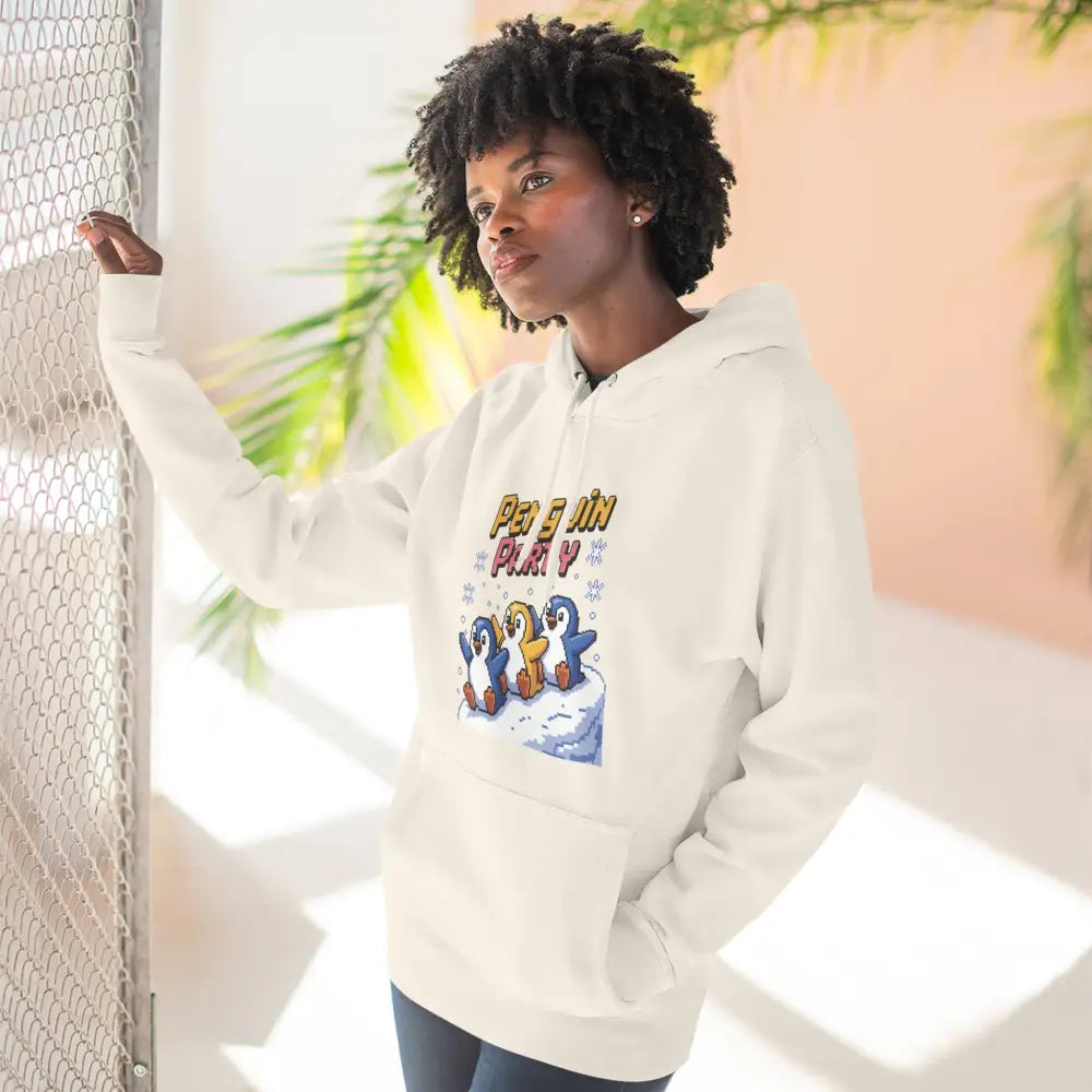 Woman in white hoodie with penguin graphic, cozy fleece sweatshirt for winter holidays