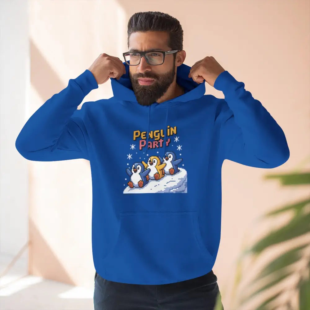 Bearded man in blue hoodie with Penguin Party graphic, cozy fleece, low heat wash, machine washable