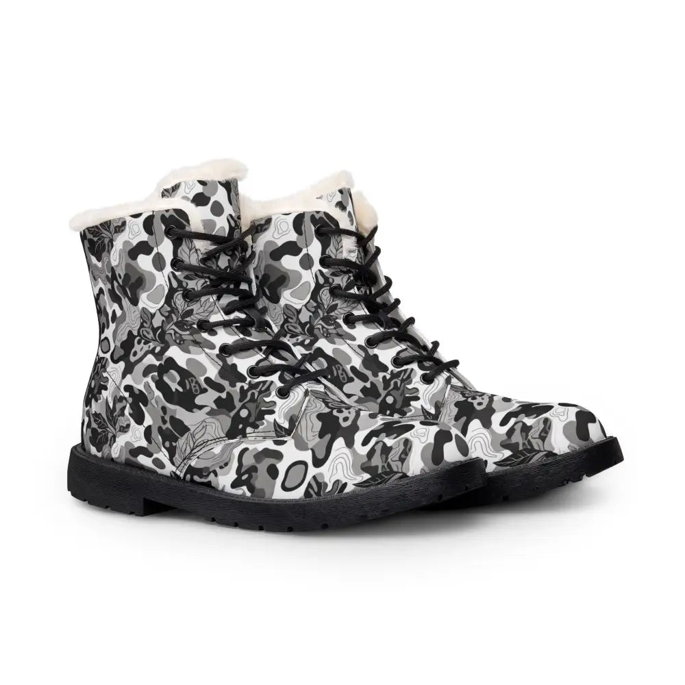 Women’s fur-lined leather boots with black and white floral camo durable microfiber exterior and fleece-lined microfiber boots