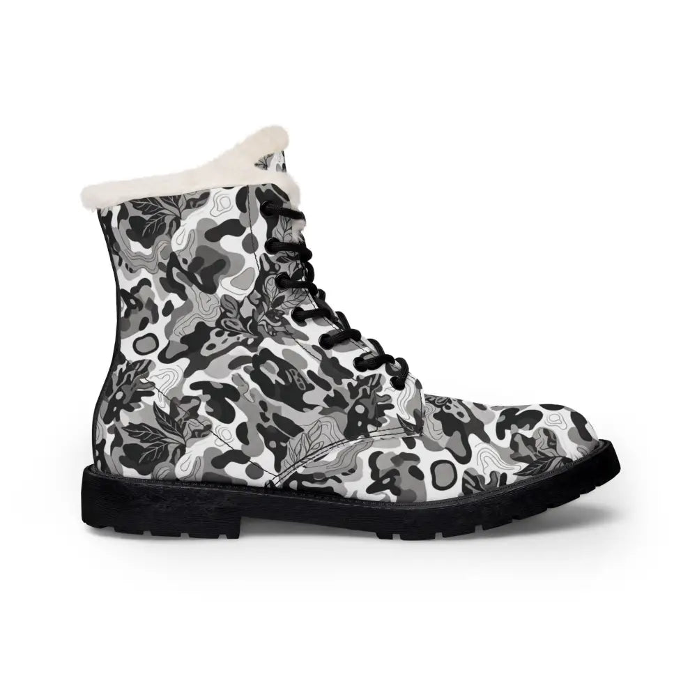 Women’s fur-lined leather boots in black and white floral camo with plush fleece-lined microfiber interior for bolder winter