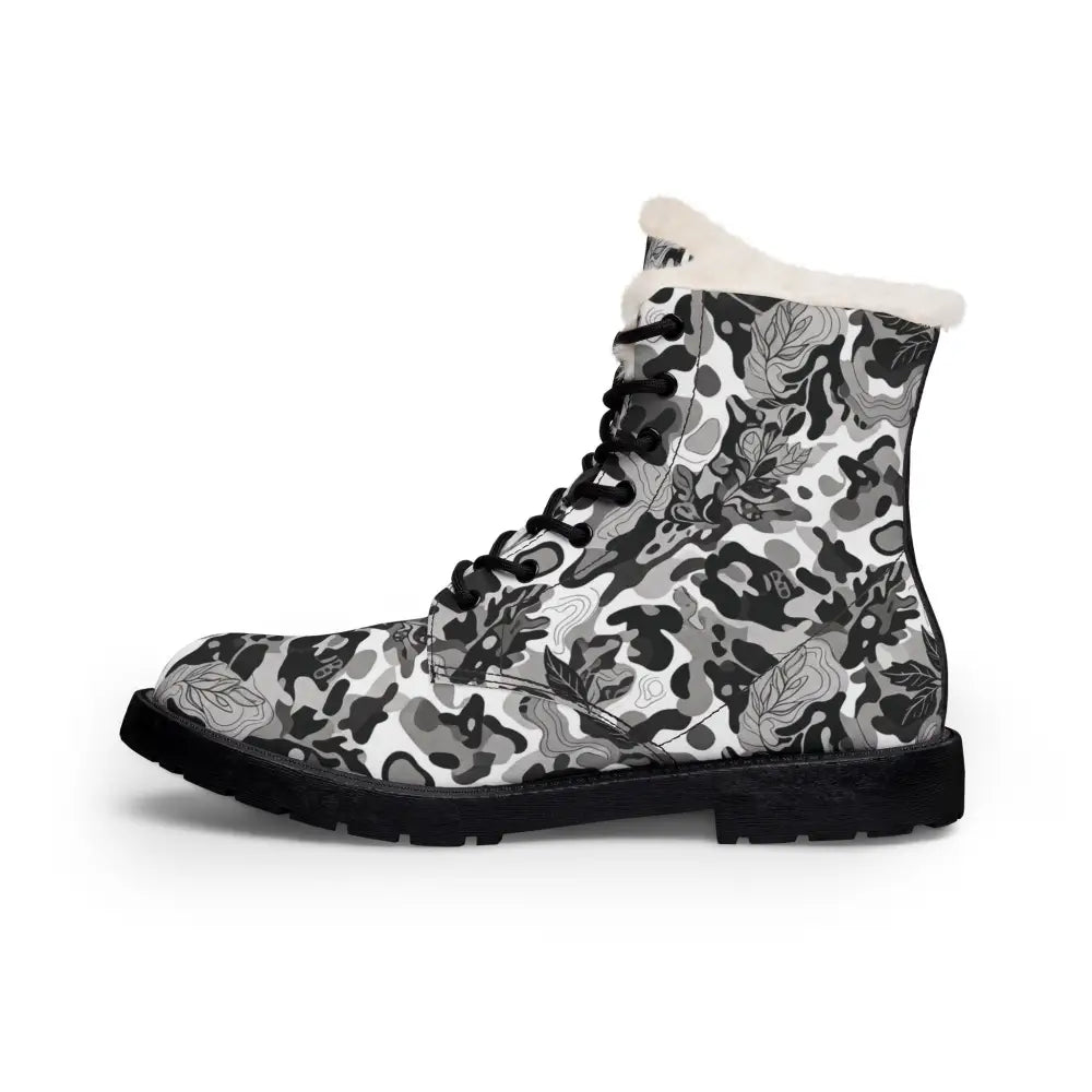 Women’s fur-lined leather boots in black and white floral camo with fleece-lined microfiber and durable exterior