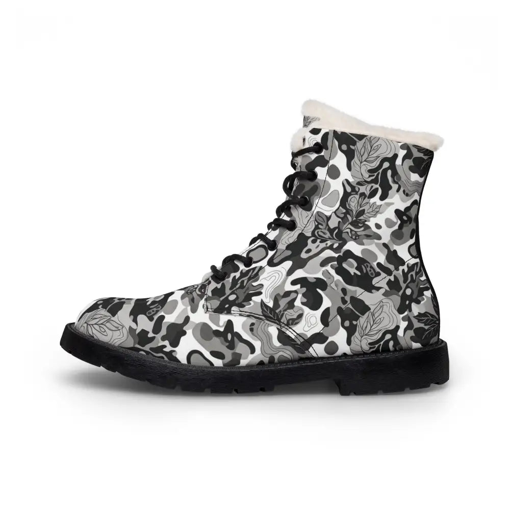 Women’s fur-lined leather boots with black and white floral camo pattern and durable fleece-lined microfiber exterior
